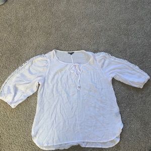 White blouse, it’s made by unique spectrum size 1x